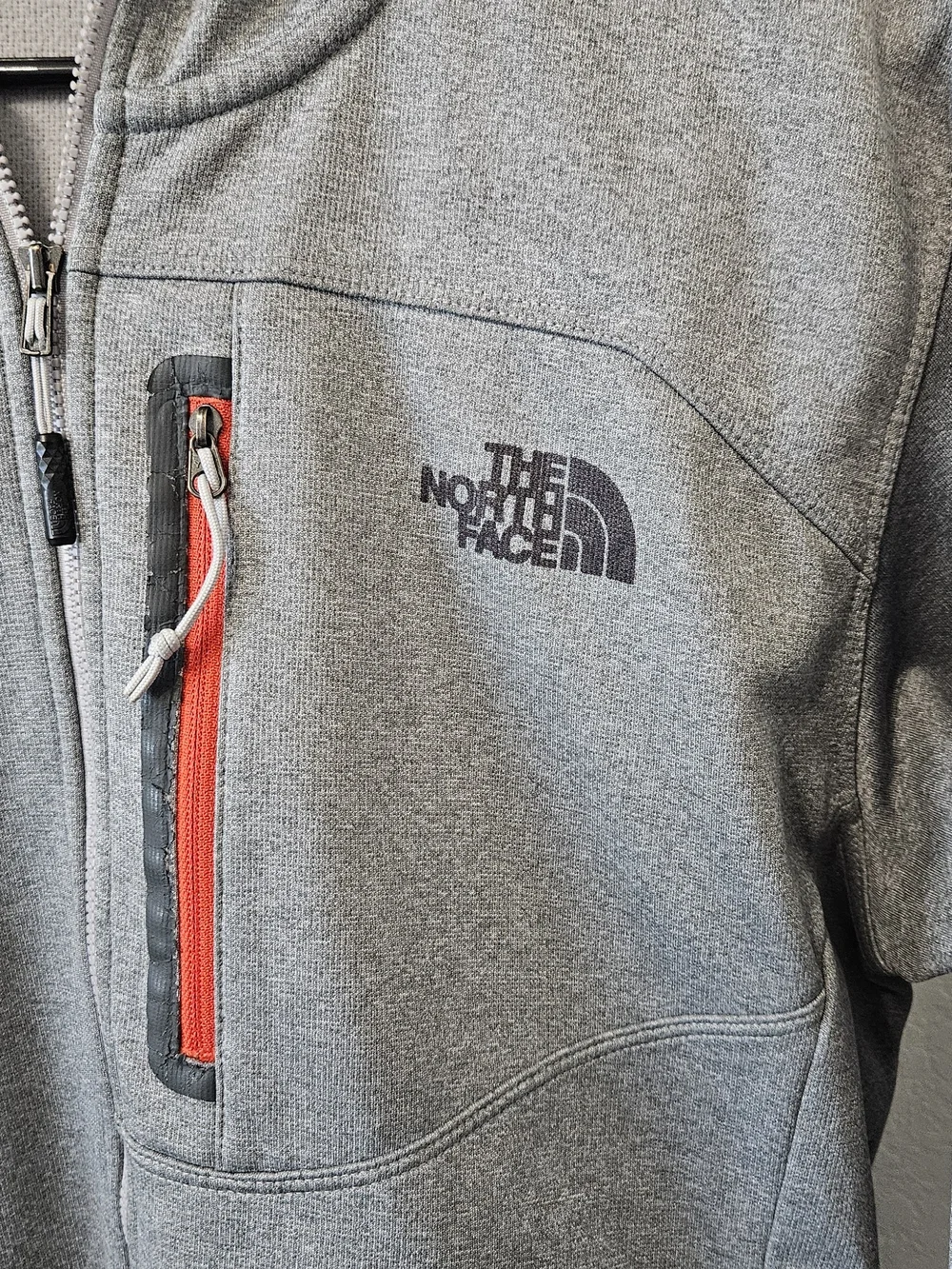 The North Face Men’s Gray Full-Zip Hooded Jacket with Red Zip Accent
